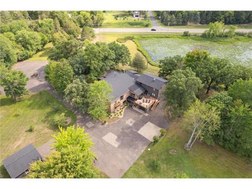 The beautiful front portion of the property that shows the perfect blend of mature trees and wetlands to give the desired privacy and calming setting