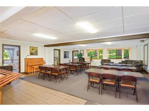The lower level dining area with two bedrooms to the left