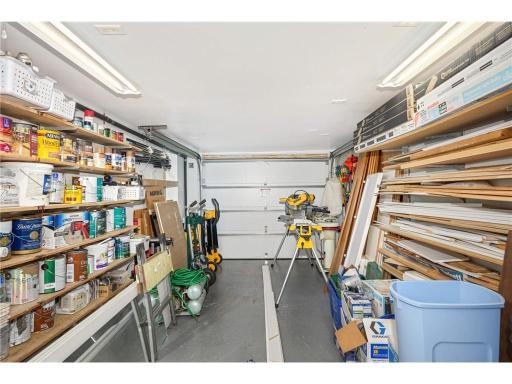 Lower level. This half has a roll up door that leads to the parking area behind the building