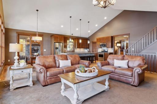 Open to both the living and dining areas, this bright, airy kitchen is perfect for those who love to entertain.