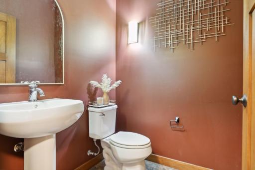 The main floor powder room is perfect for guests or for freshening up before heading out.