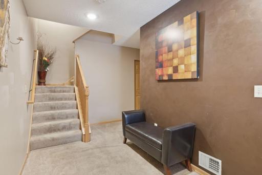 hallway to storage, utility and laundry room