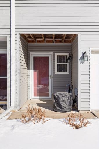 front door tucked in next to garage