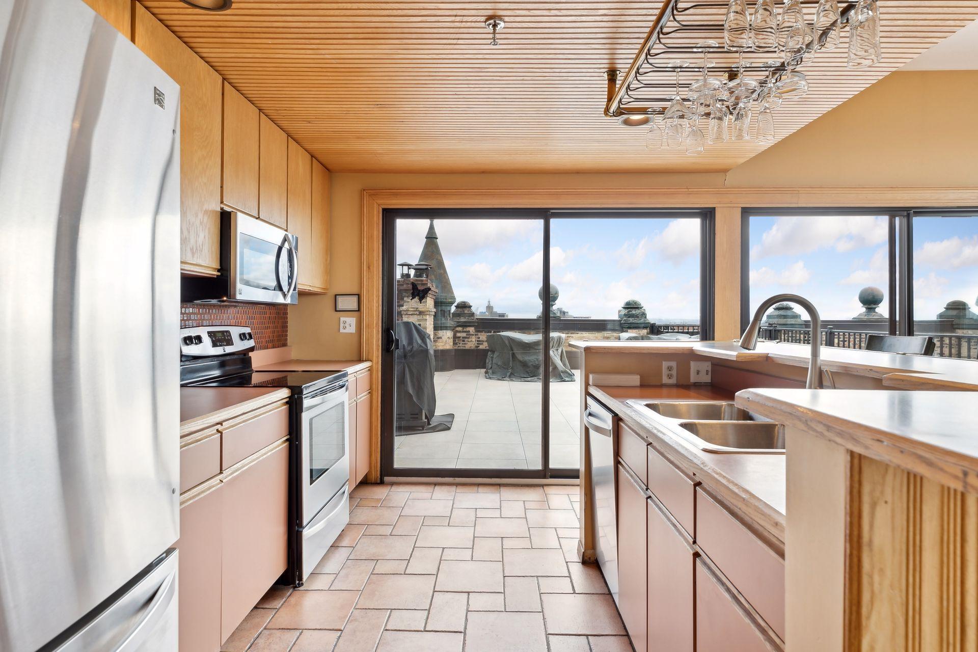 Penthouse common area opens to rooftop deck