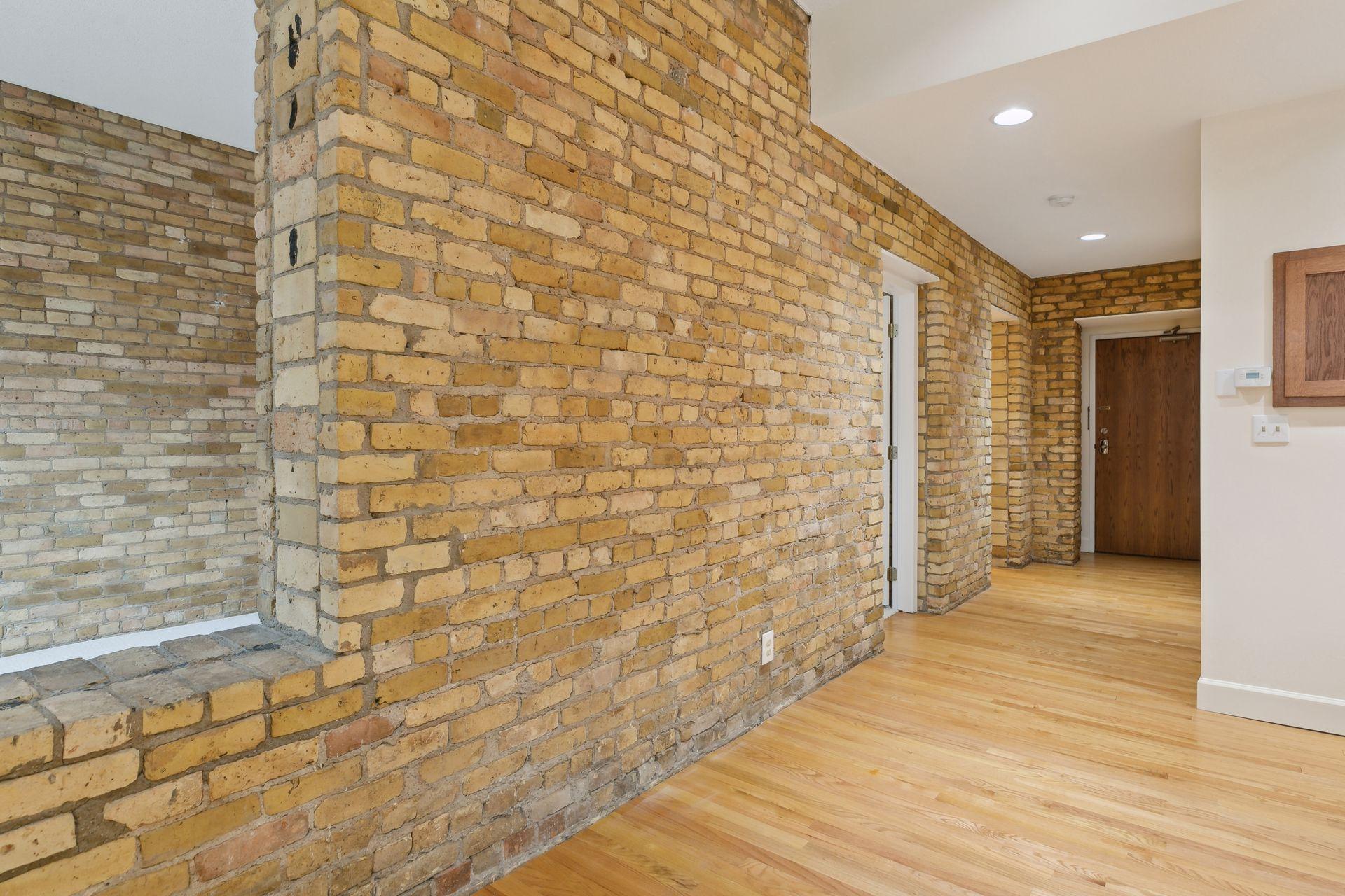 Gorgeous exposed brick throughout the unit