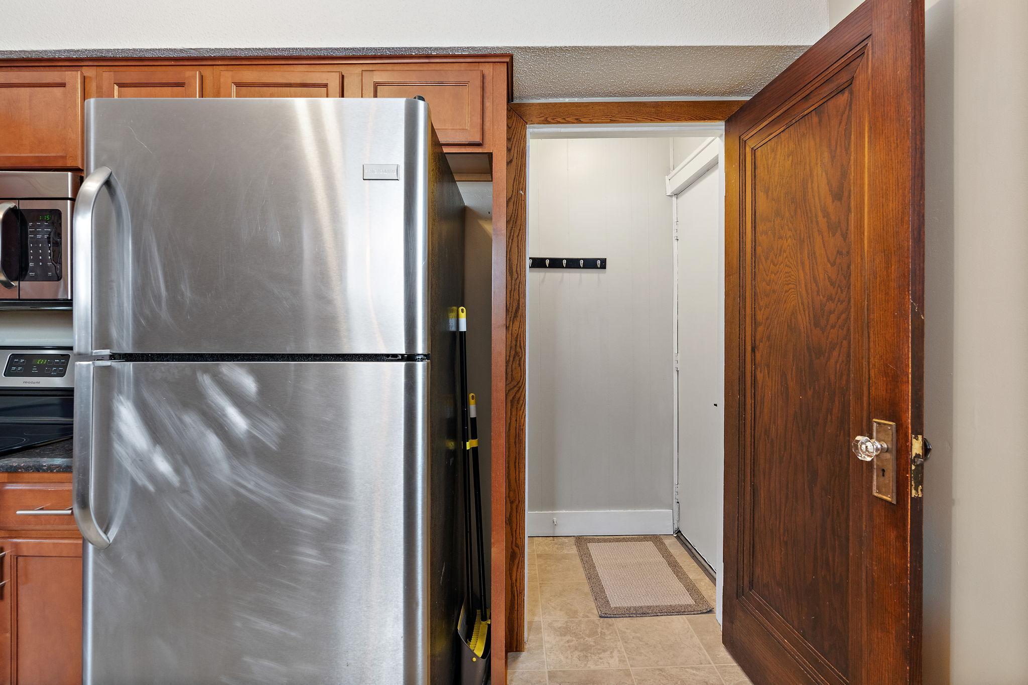 A door to the backyard is located off the kitchen.