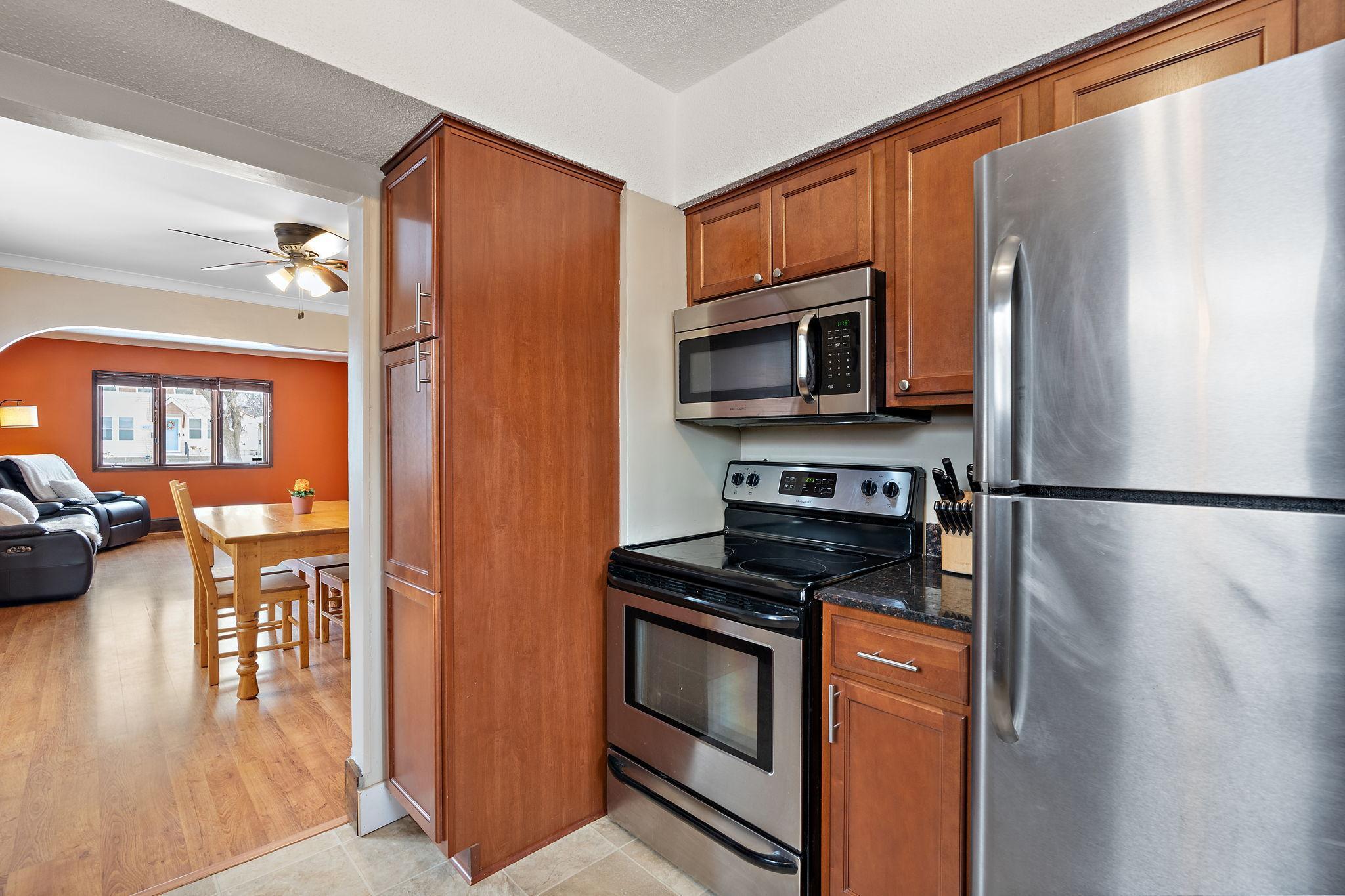 The kitchen has stainless steel appliances.
