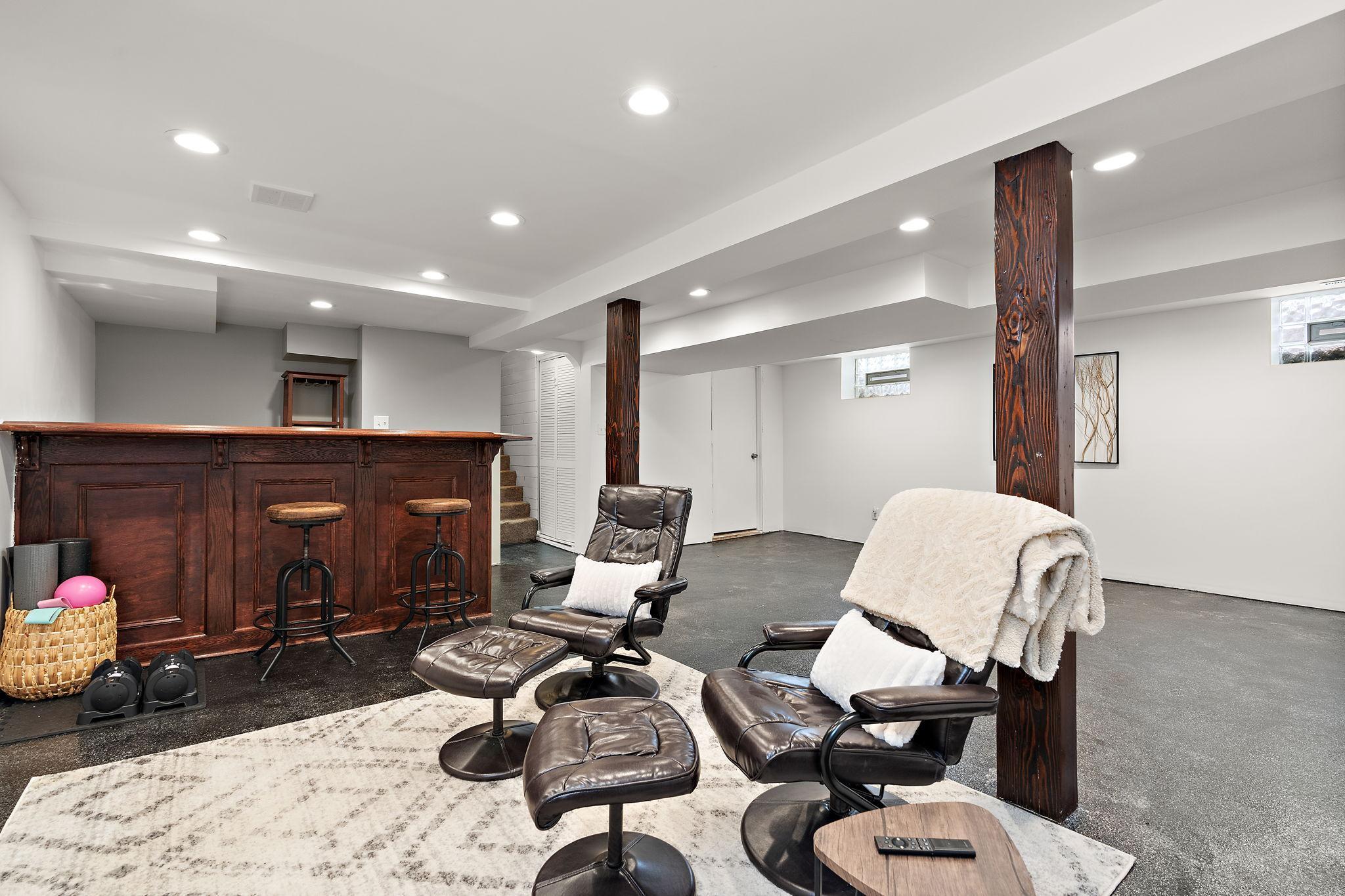 The lower level family room has enough space for a TV zone and more!