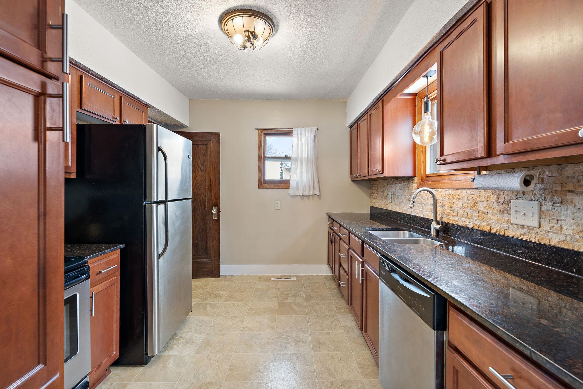 The kitchen offers plenty of natural light.