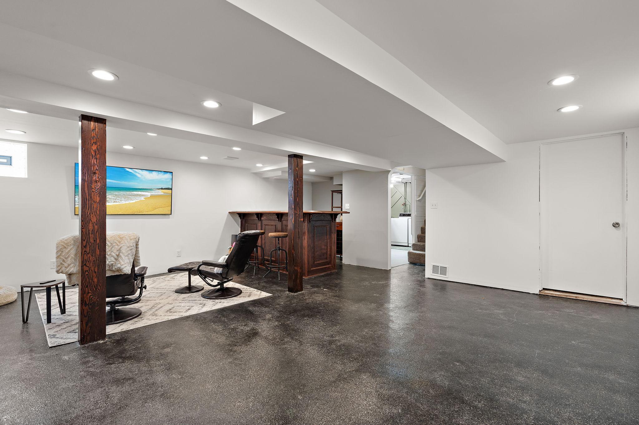 The lower level family room has a wet bar for entertaining!