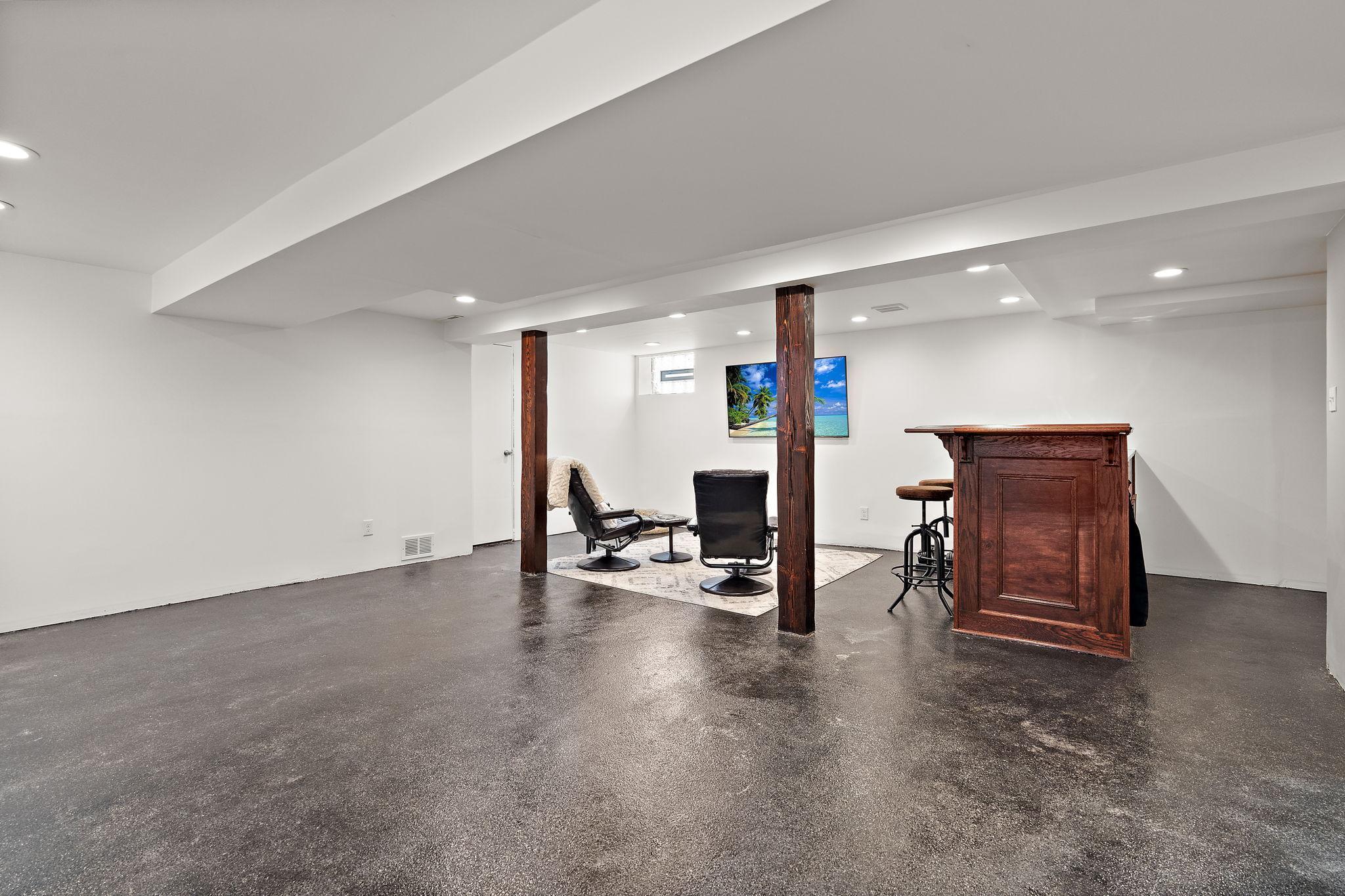 The lower level family room is large and open.