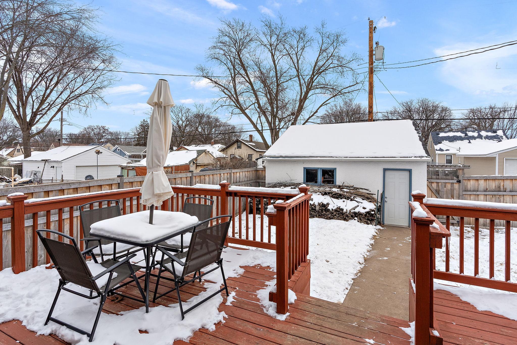 A deck off the back of the house allows quick access to the detached garage.
