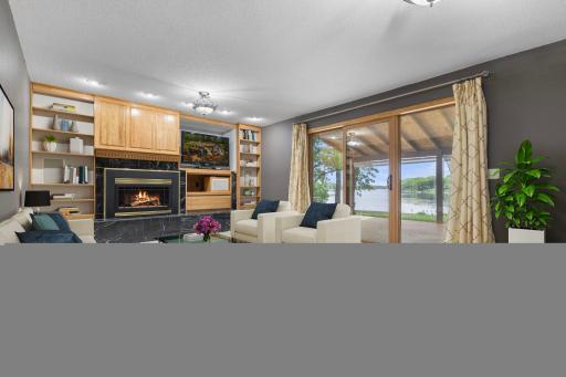 Family Room with walkout to back deck (virtually staged)