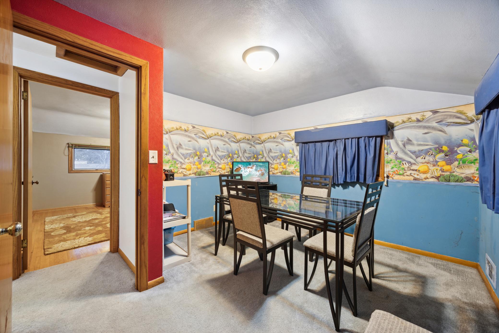 Fourth upper level bedroom, currently used as office space. Sellers believe there is hardwood flooring under the carpet.