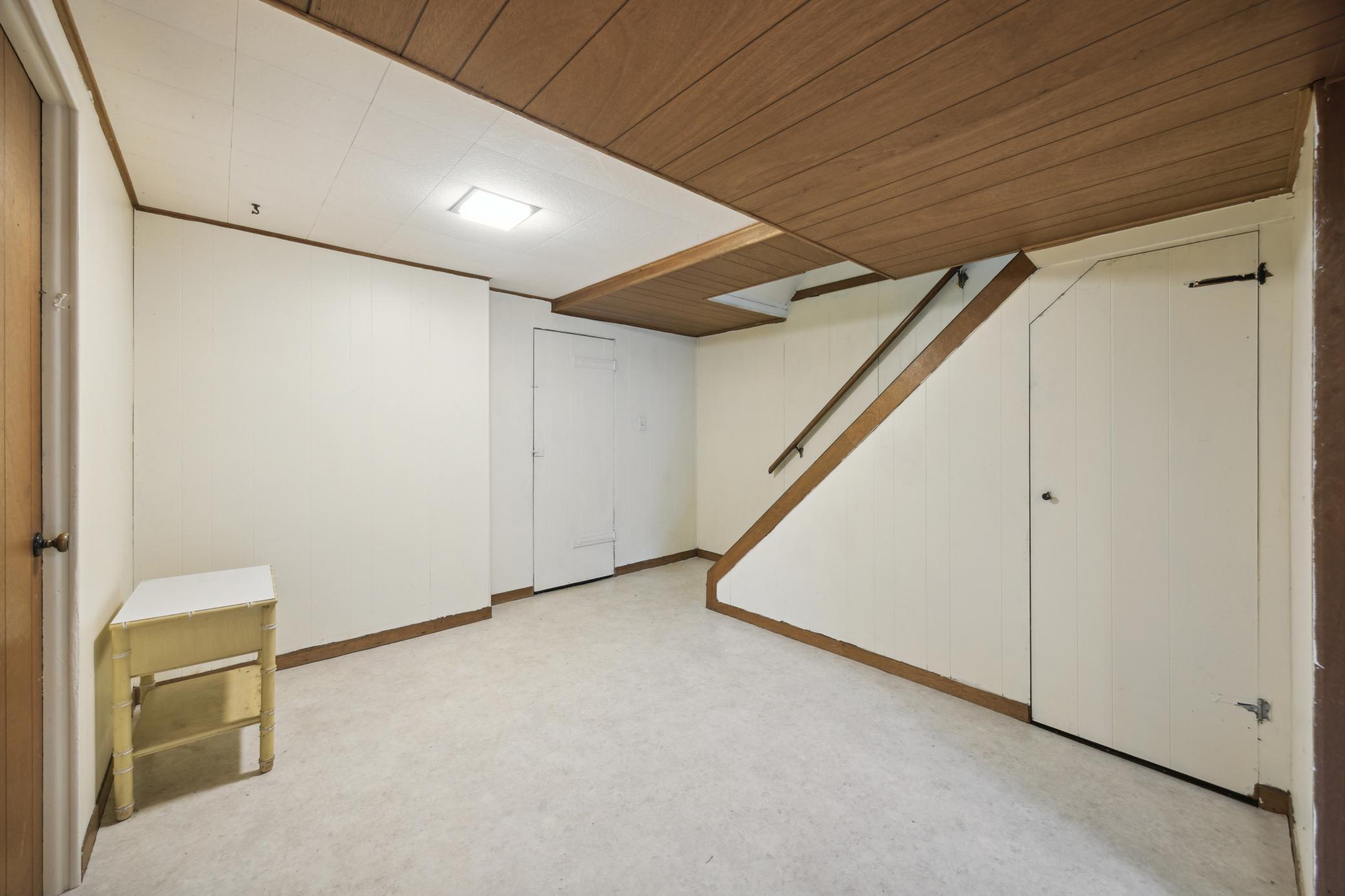 Another view of the family room looking towards the stairway.