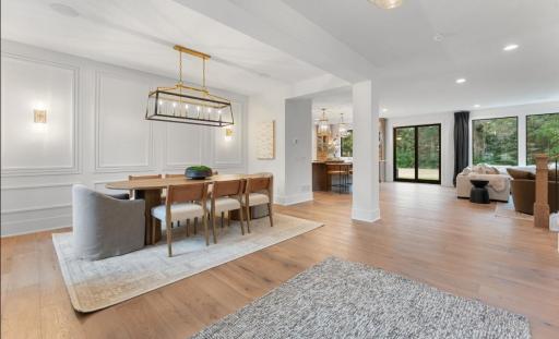 Inviting foyer entry with views of dining, great room, kitchen and rear patio and yard.