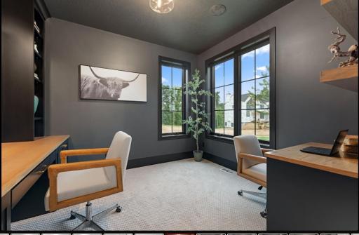 Statement His/Hers Study features built in desks, open shelving and wrap around corner windows.