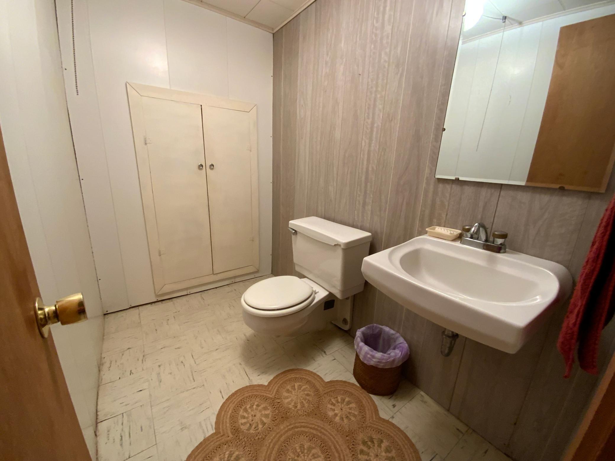 Half bath in basement. Walk-in shower adjacent to complete 3/4 bath in lower level.