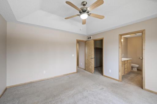21 Primary bedroom bathroom and walk-in closet