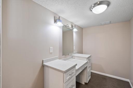 Lower level bonus room with a custom made vanity table!