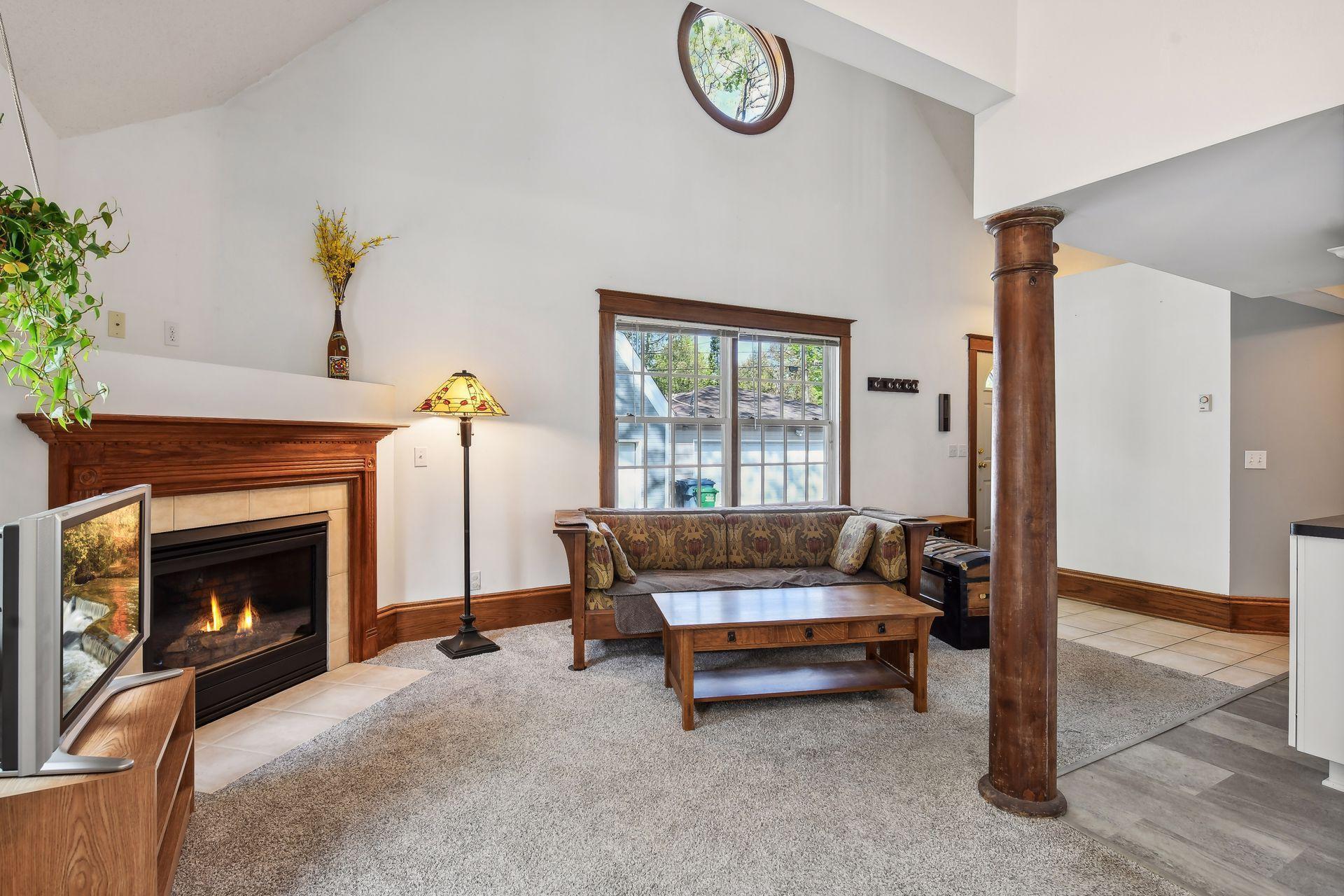 The inviting, two story addition has a cozy gas fireplace