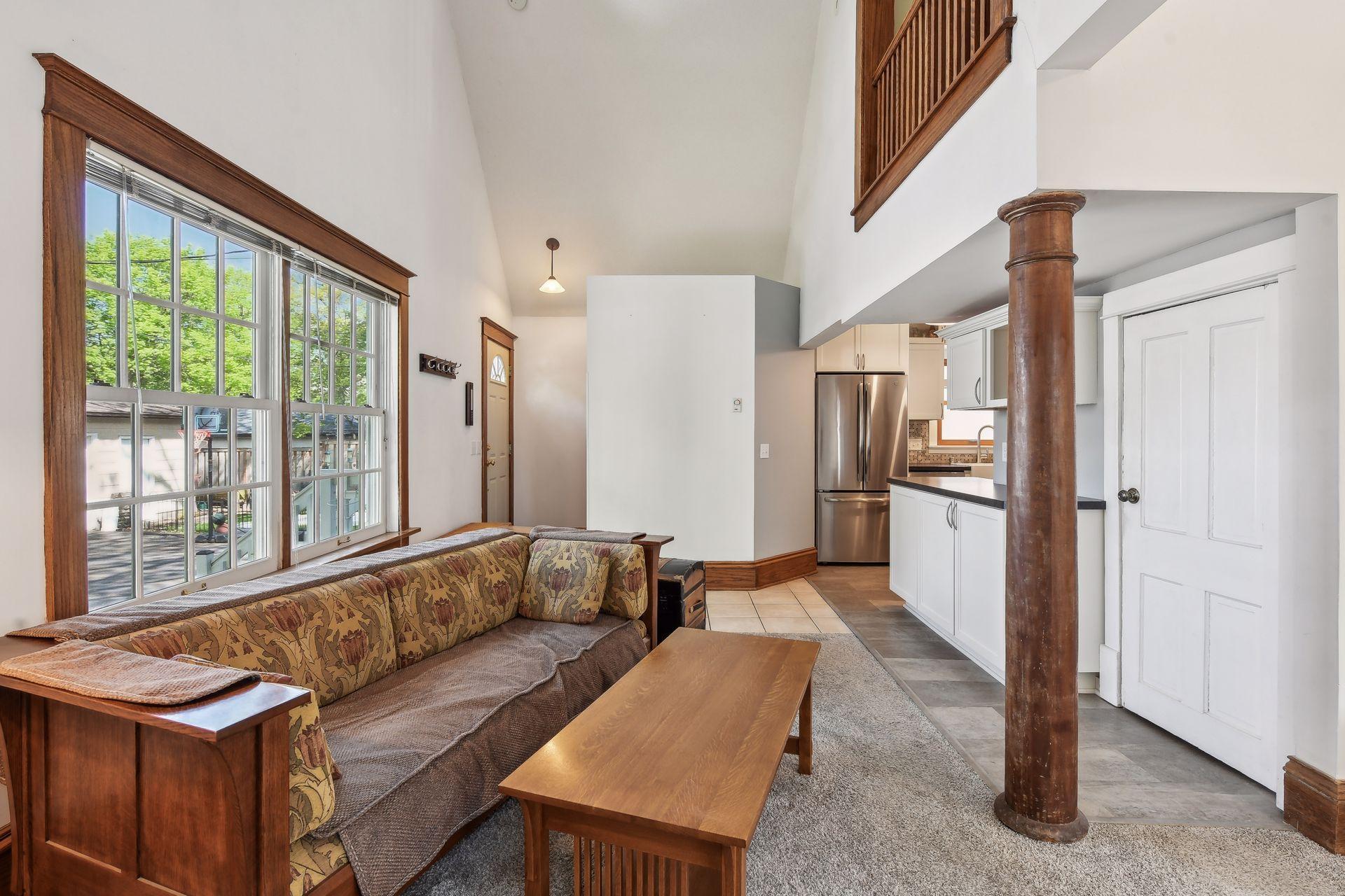 The main floor powder room is next to the back door