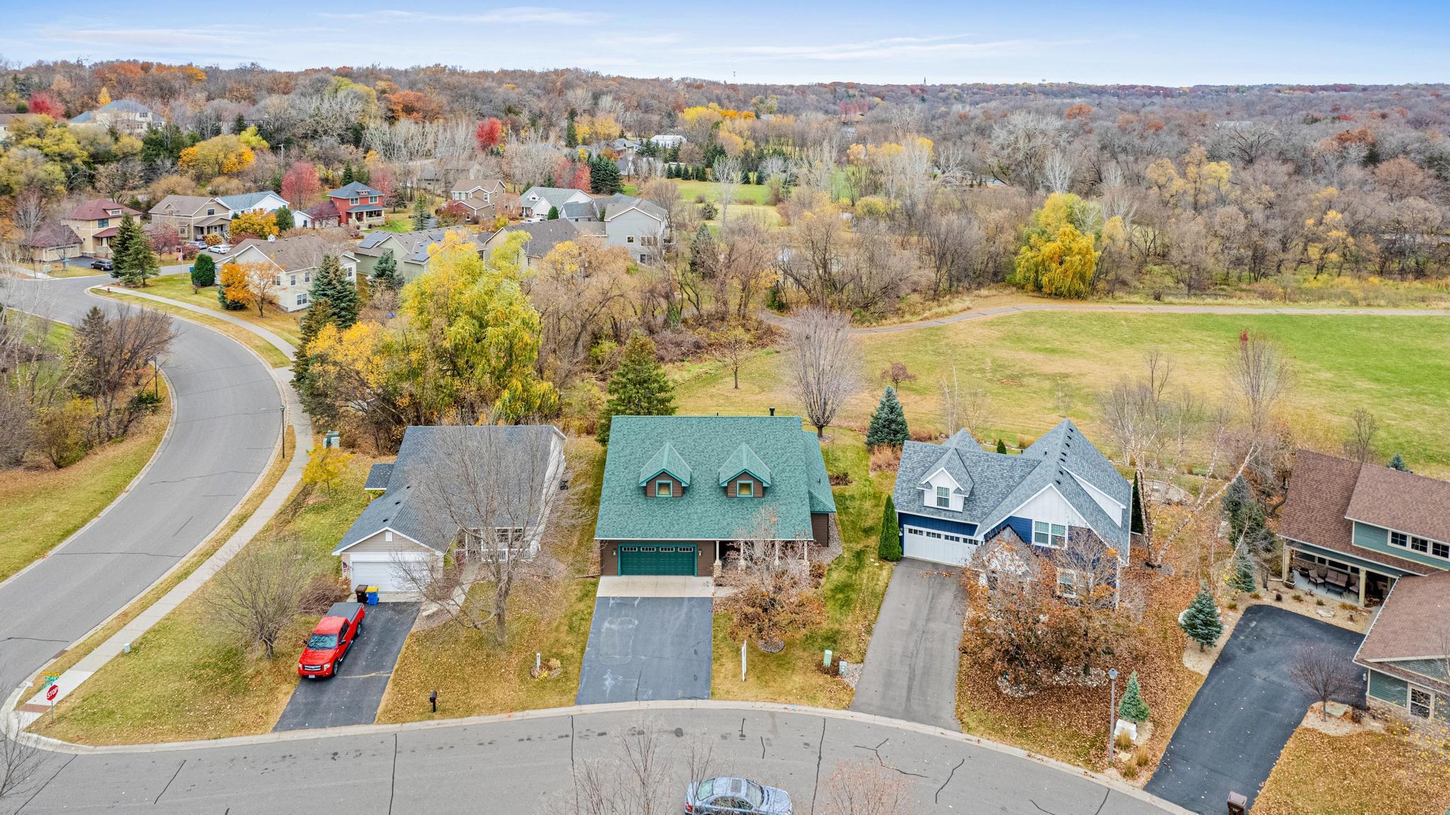 Backs up to 9 acres of park land