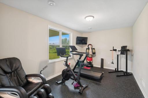 Large workout area complete with padded flooring