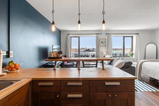 Spectacular downtown condo offering amazing city views through oversized picture windows & river views from the rooftop patio!