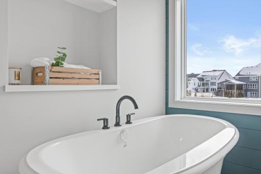 Large soaking tub in the primary bathroom