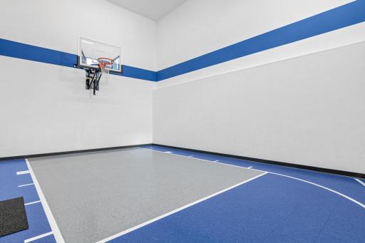 The sport court is a hot spot for of the home with the perfect touch of blue!