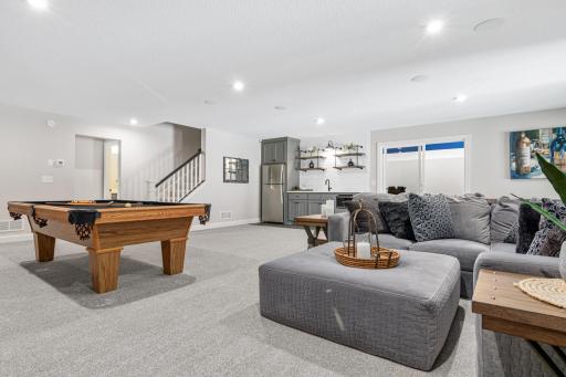 Lower level family room leads into the sport court & fitness center