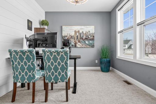Office #1 at front of the home with large windows