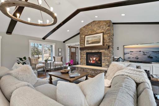 The perfect place to unwind â a stunning fireplace that enhances the ambiance of the room.