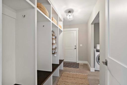 A well-appointed mudroom with built-in cubbies, perfect for keeping everyday essentials organized.