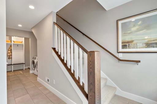 Elegant and inviting, this staircase leads you to the next level of comfort and style.