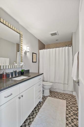 Convenient main-level bathroom, offering easy access and thoughtful design for both guests and daily use.