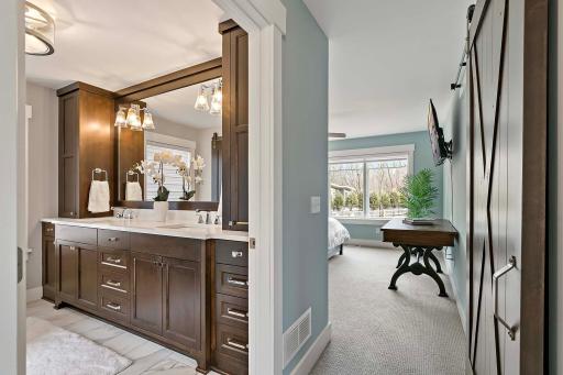 Enjoy the ultimate in comfort and convenience with a beautifully adjoining master bedroom and bathroom.