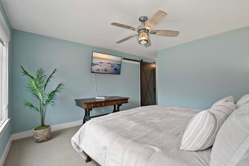 Behind the sliding door is a large walk-in closet!