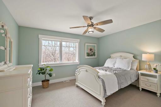 Bright and airy upstairs bedroom with plenty of natural light, perfect for rest and relaxation.