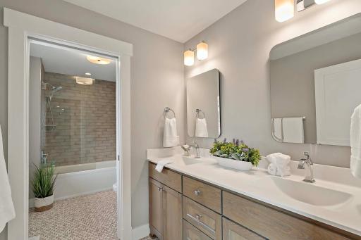 Conveniently located upstairs bathroom featuring modern finishes, a spacious layout, and a relaxing ambiance for ultimate comfort.