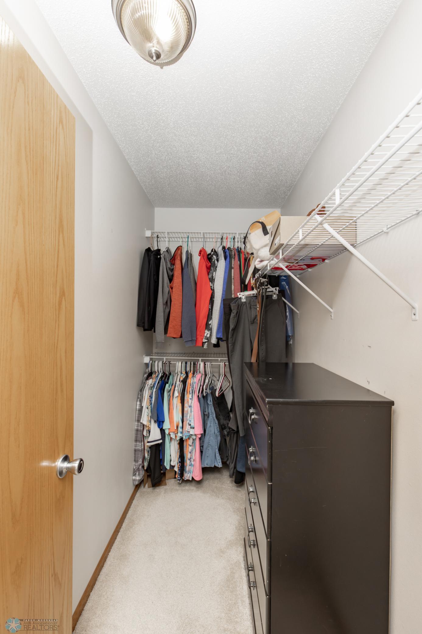 Master bed walk-in closet