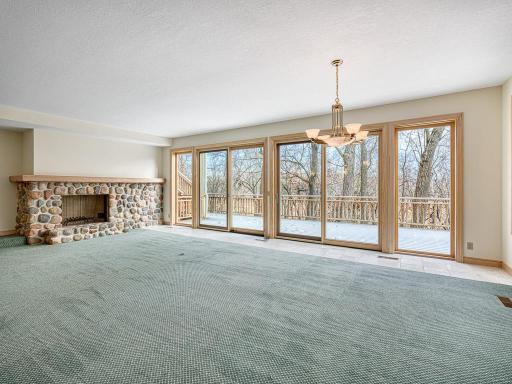 Beautiful stone fireplace and impressive views.