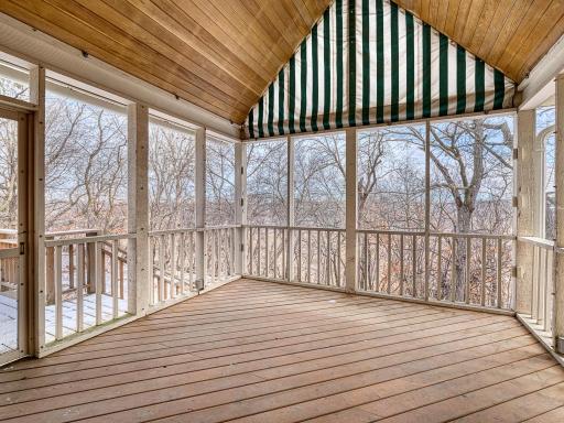 Private and screened in porch overlooking trees and marsh area.