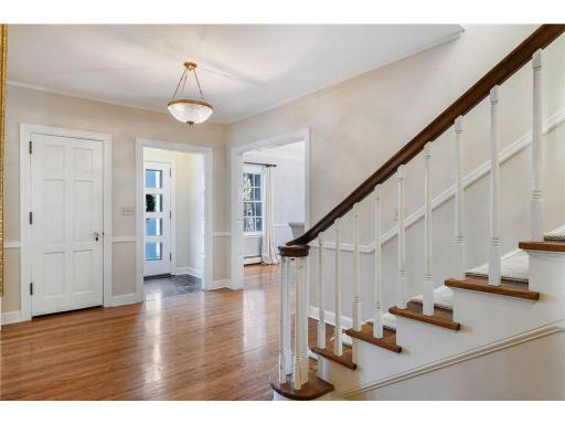 Gleaming hardwood floors and stunning detail work throughout