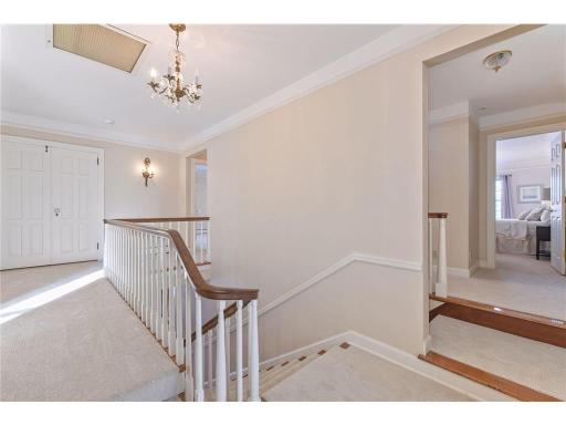 Property features two staircases to the upper level