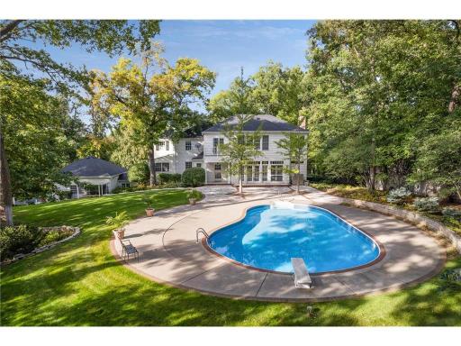 Gorgeous heated pool with stamped concrete surround