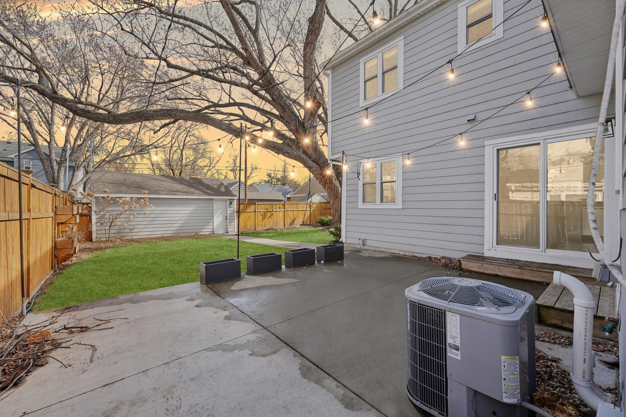 The back yard patio has been expanded. Perfect space for outdoor dining & entertainment!