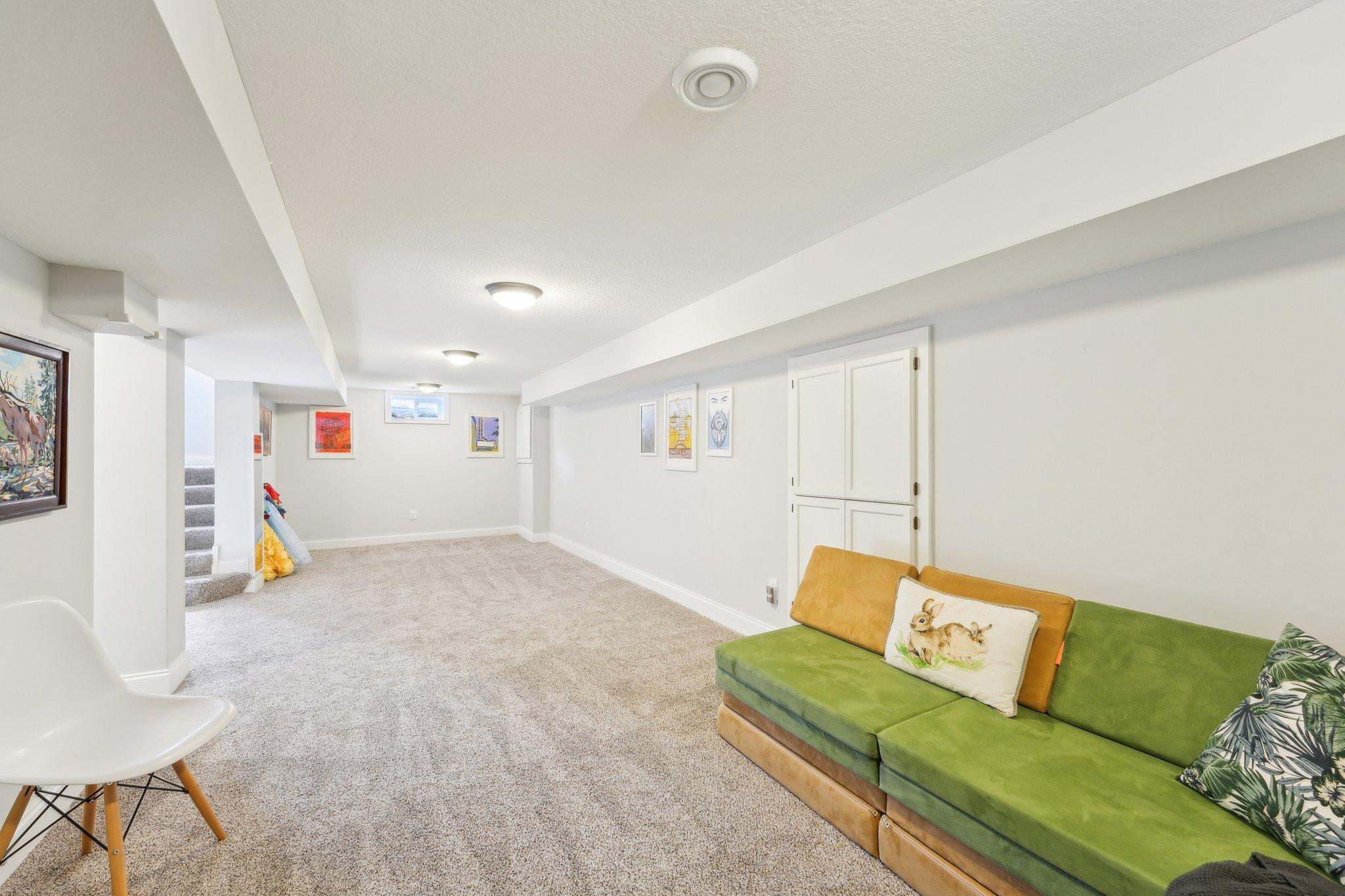 The opposite end of the room could be a play area for the kids, your workout space, music nook...endless possibilities!