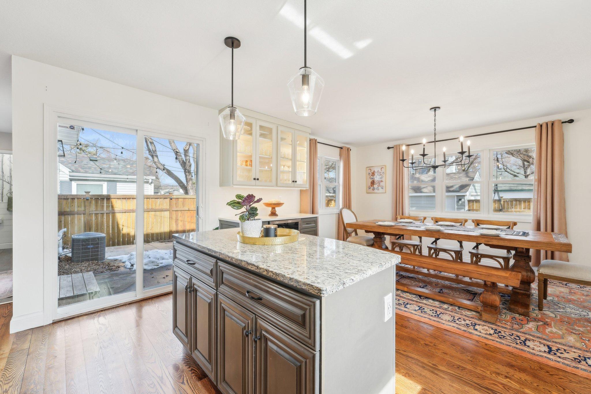The kitchen is paired with the dining room & walks out to the back yard patio. Perfect setup for outdoor cooking & entertaining!